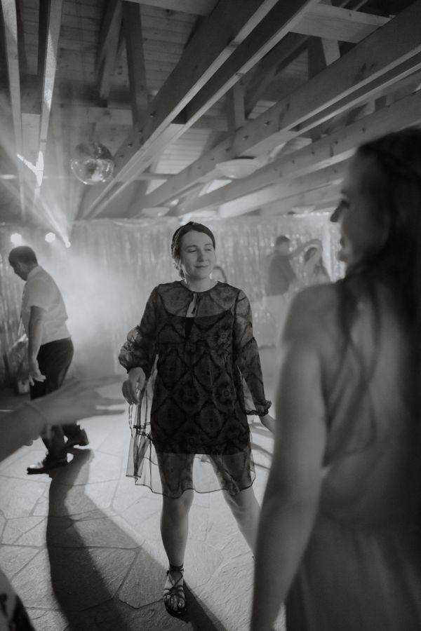 Lilla dancing at a community event, in black and white