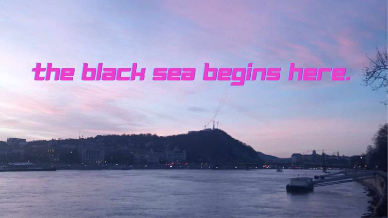 The Danube at dusk with the words 'the black sea begins here'